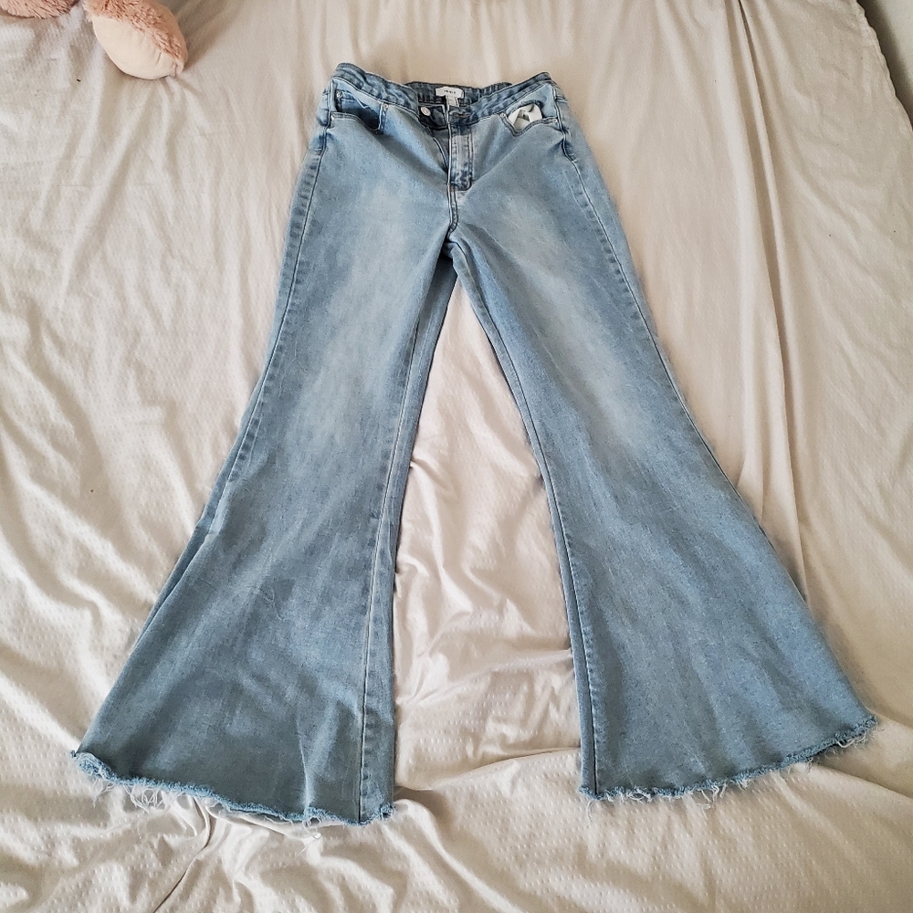 high-waisted flare jeans with back design